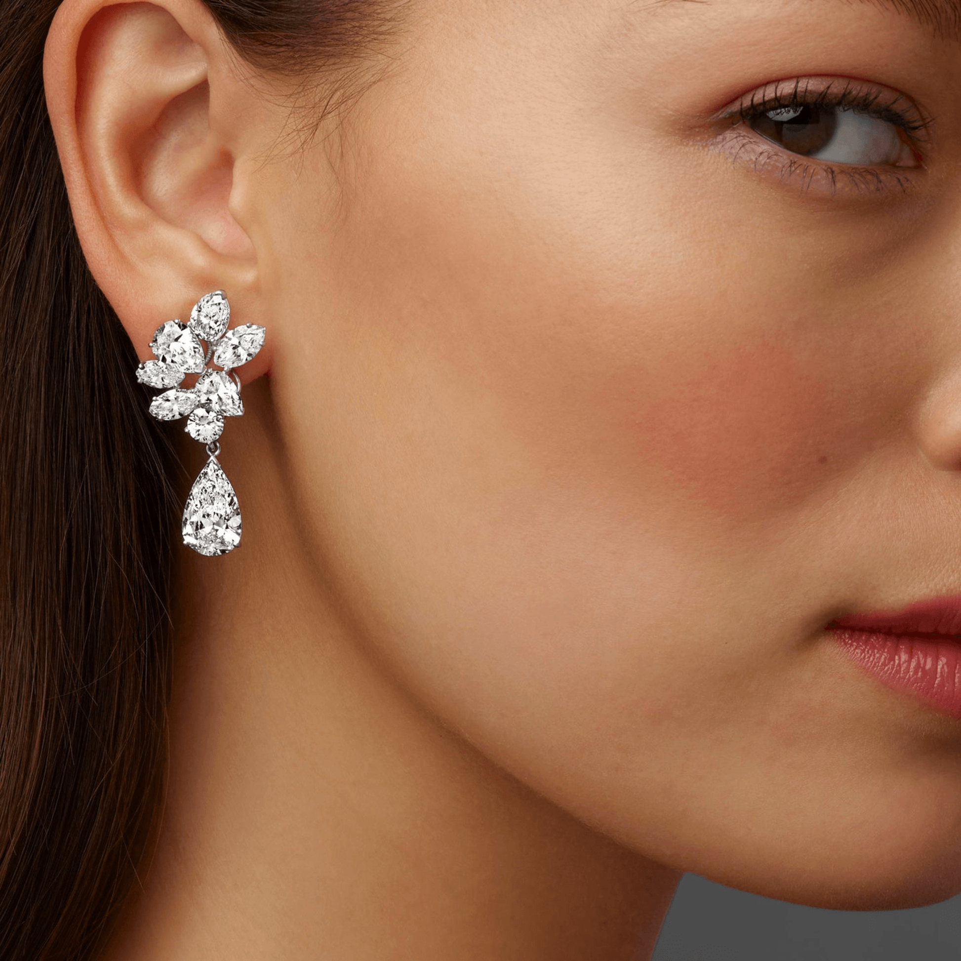 Oscar Heyman Bros. 1960s Platinum Diamond Earrings on ear