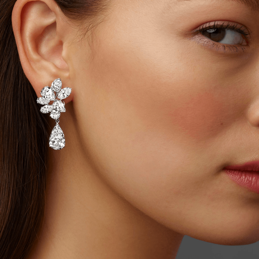 Oscar Heyman Bros. 1960s Platinum Diamond Earrings on ear