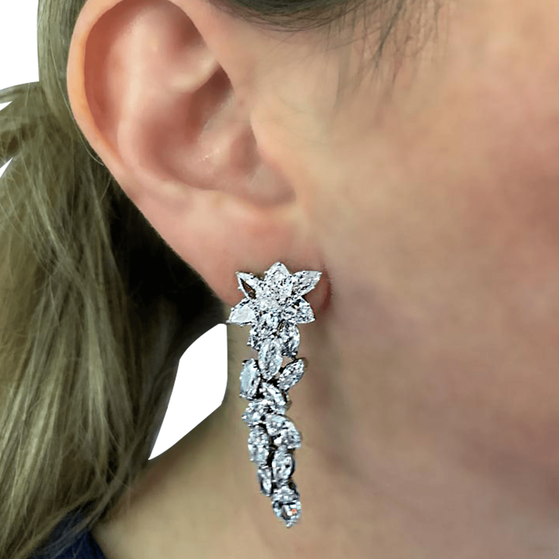 Contemporary 18KT White Gold Diamond Earrings on ear