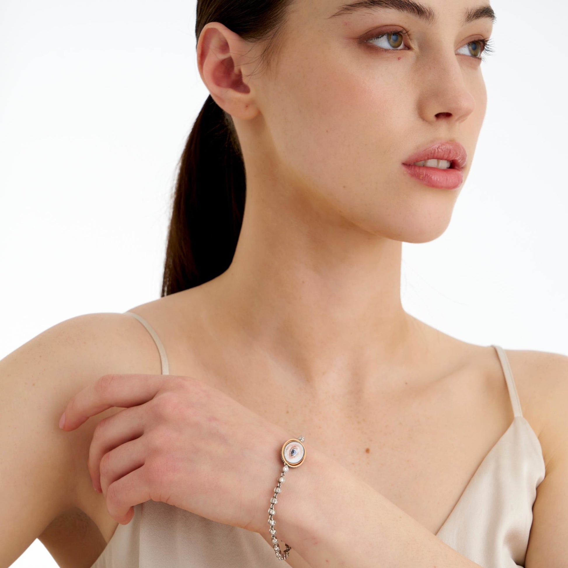 Contemporary Platinum & 18KT Yellow Gold Opal, Diamond & Enamel Lover's Eye Bracelet on wrist
