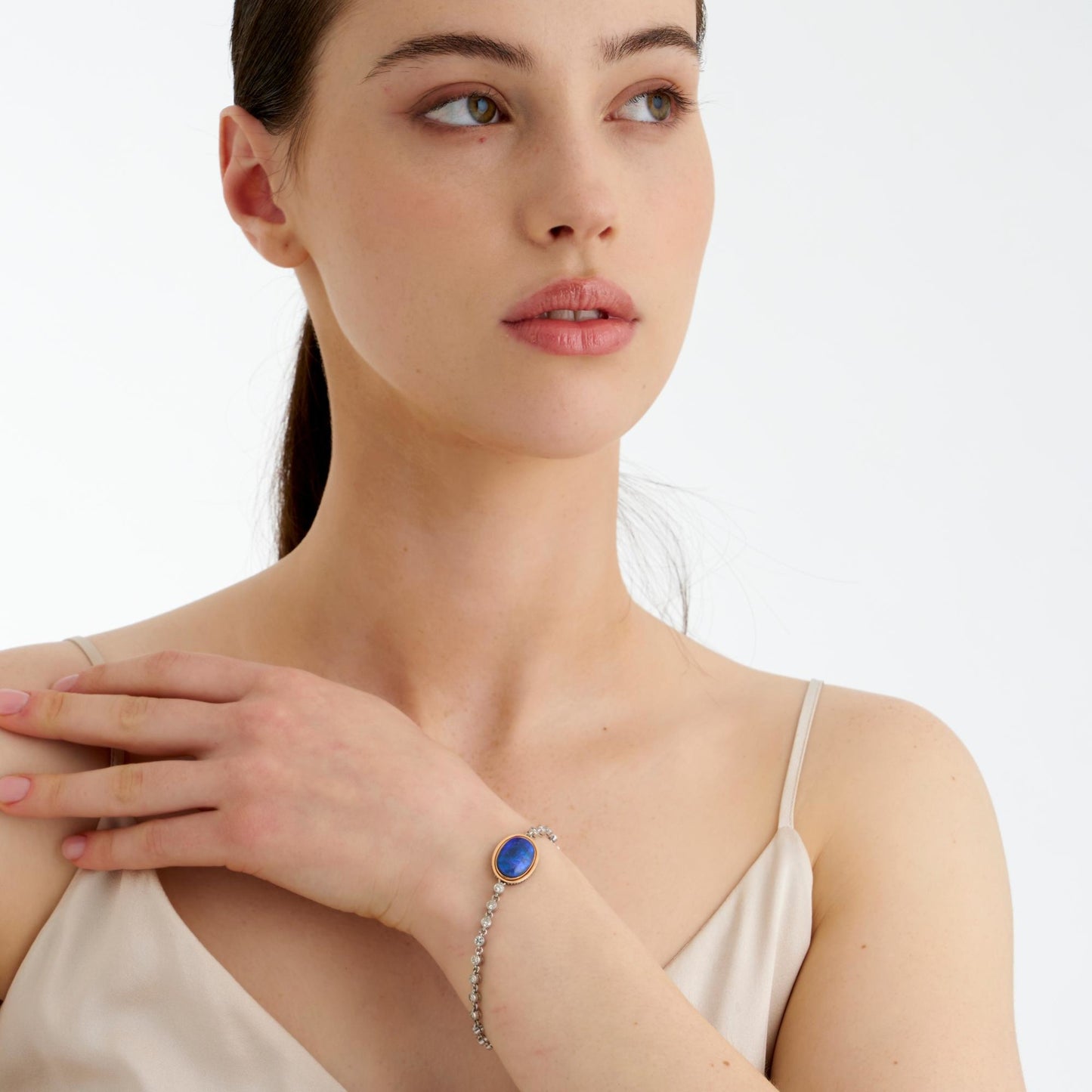 Contemporary Platinum & 18KT Yellow Gold Opal, Diamond & Enamel Lover's Eye Bracelet on wrist
