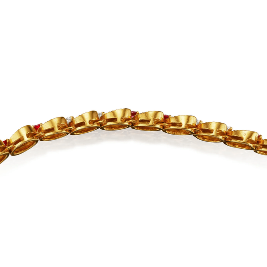 Gubelin and Péry et Fils 1960s 18KT Yellow Gold Diamond & Ruby Set bracelet side