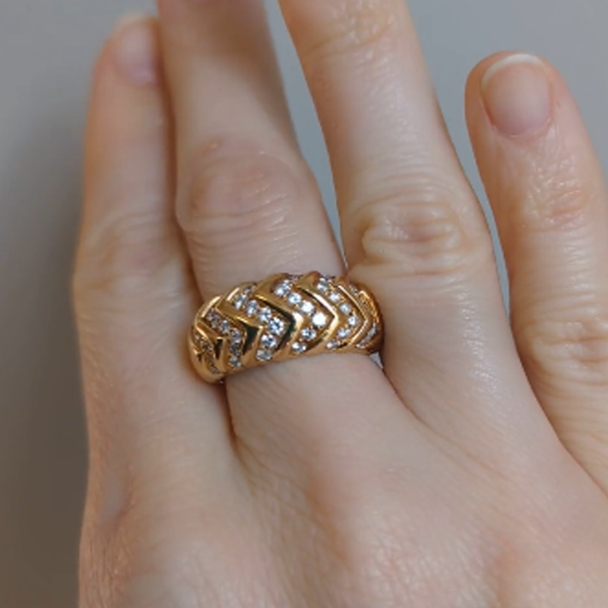 Bulgari Italy Post-1980s 18KT Yellow Gold Diamond Spiga Ring on finger