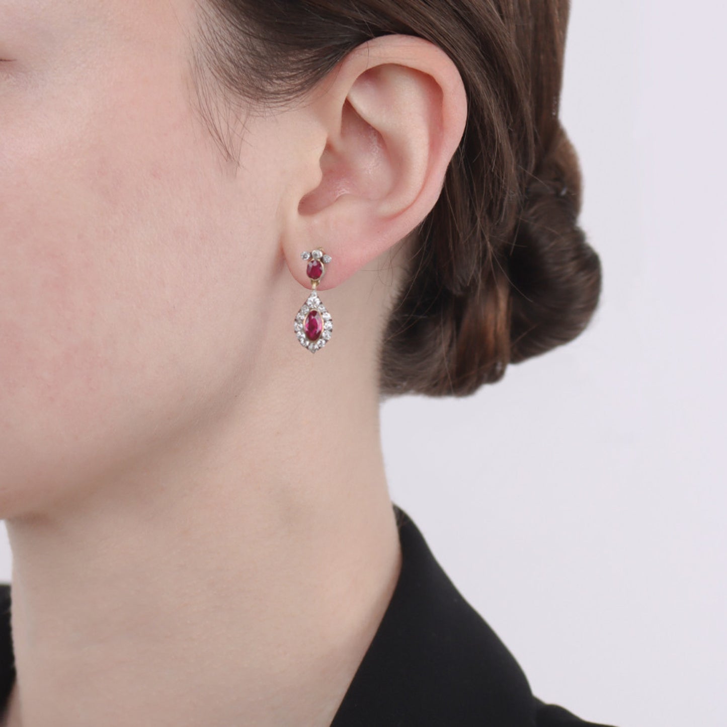 Victorian Silver & 18KT Yellow Gold Ruby & Diamond Earrings on ear