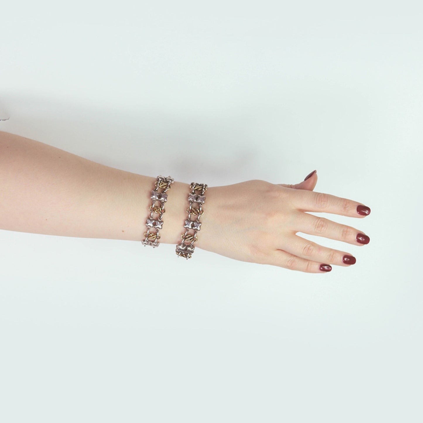 R. Lyon London Victorian Silver & 18KT Yellow Gold Bracelets on wrist