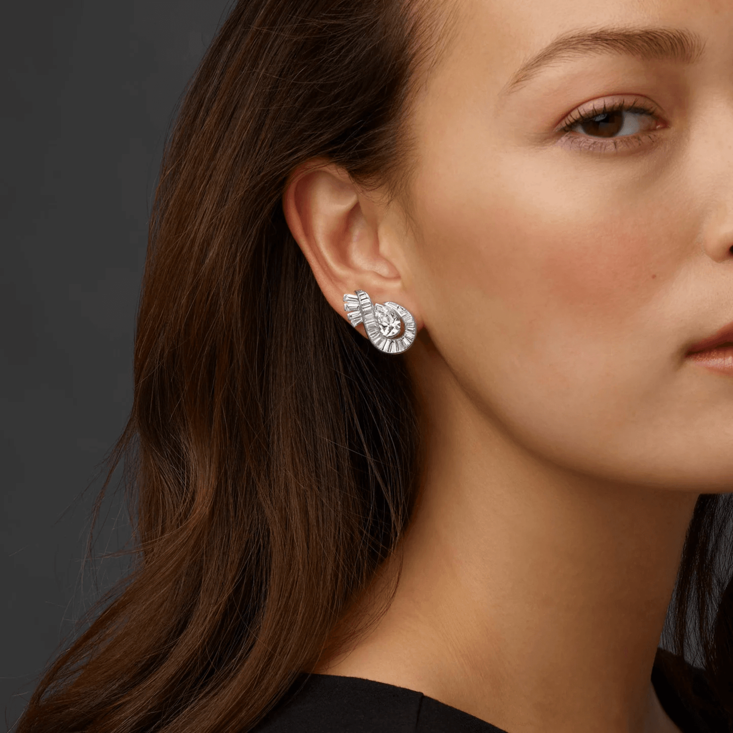 Oscar Heyman Bros. 1950s Platinum Diamond Earrings on ear