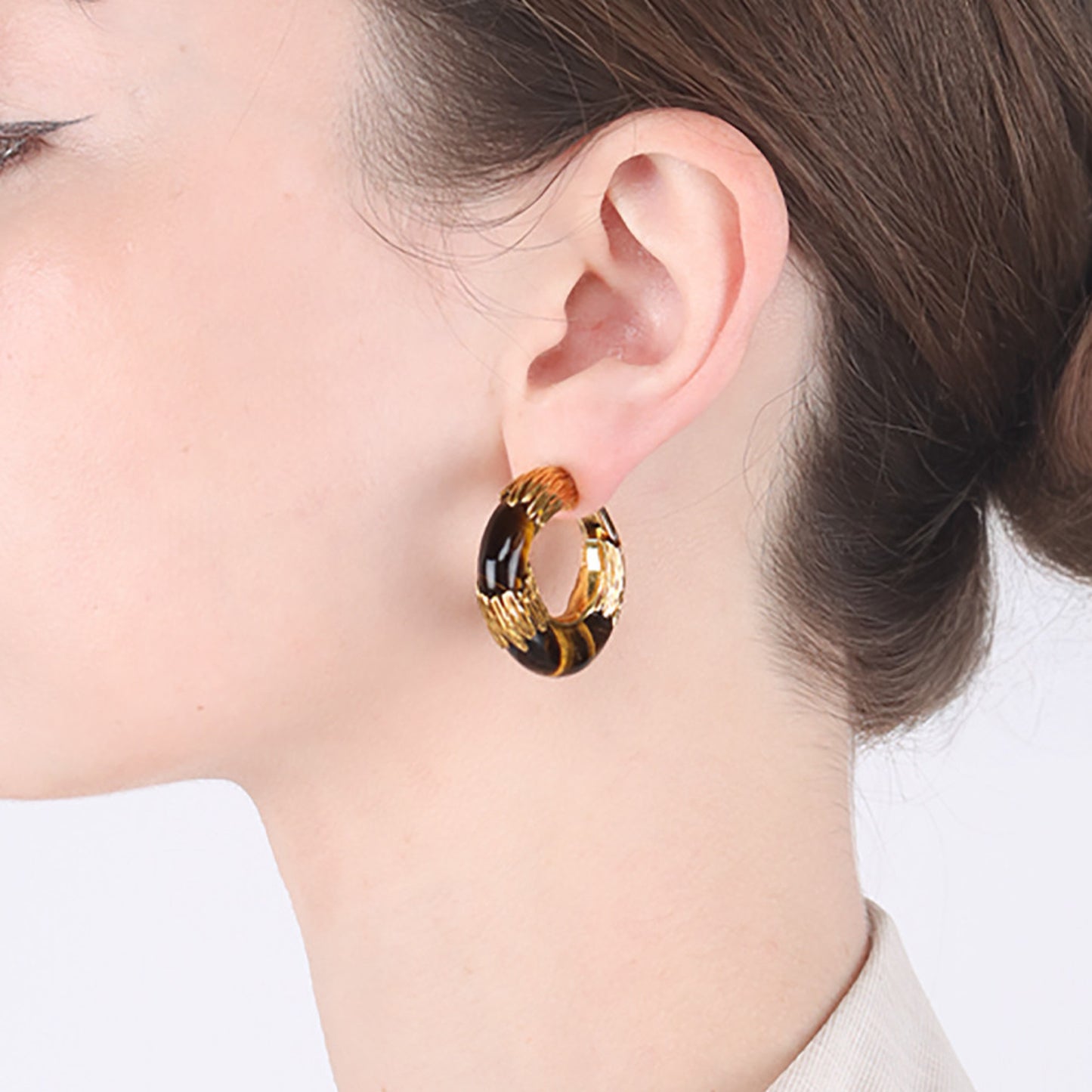 Kutchinsky English 1970s 18KT Yellow Gold Tiger's Eye Earrings on ear