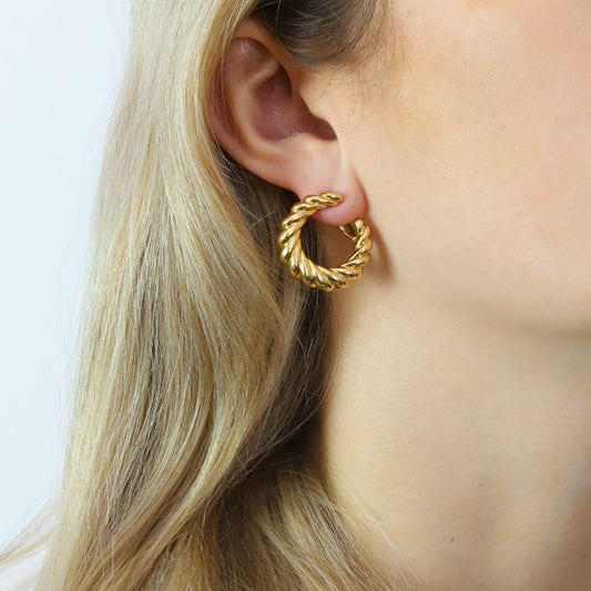 Cartier French 1980s 18KT Yellow Gold Earrings on ear