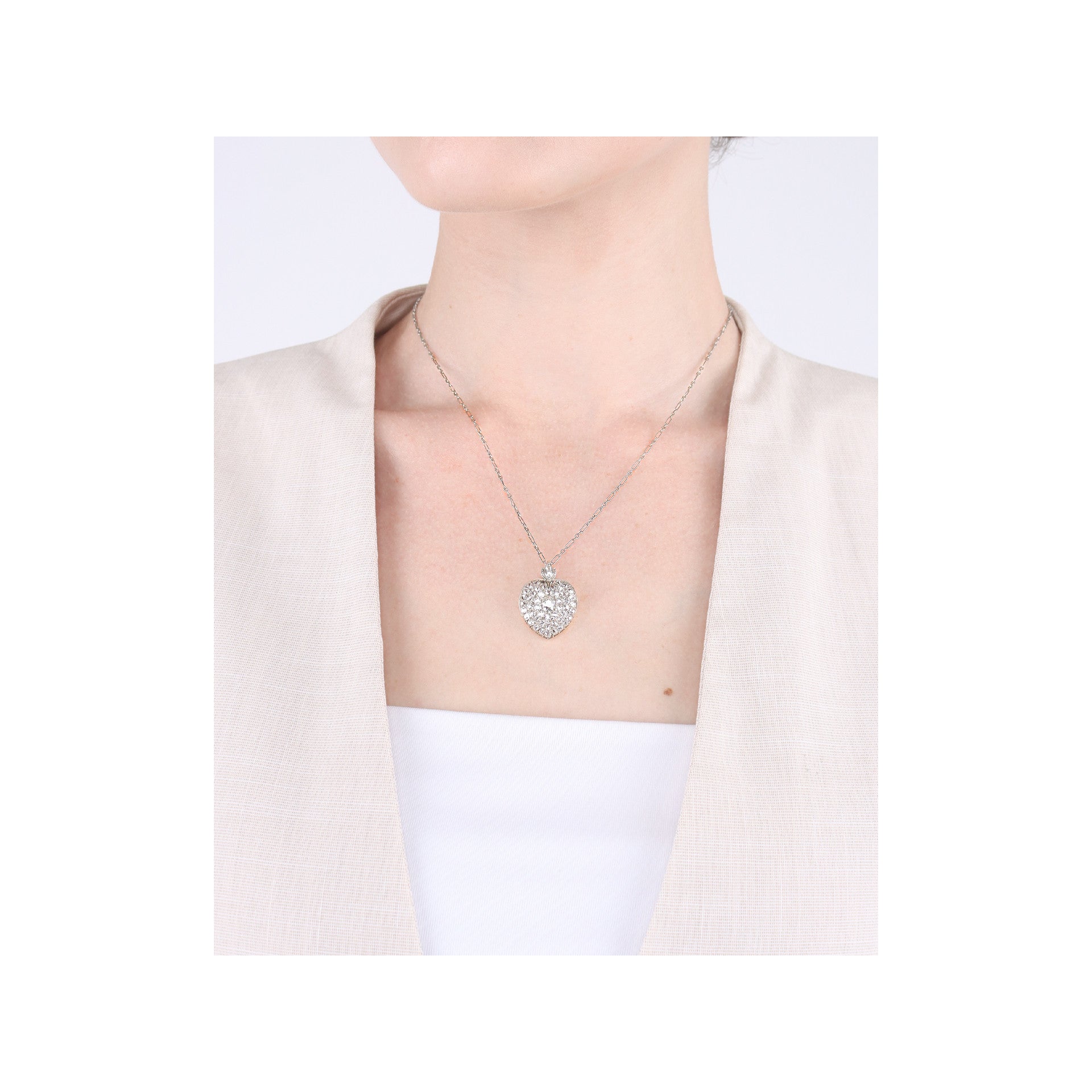 Victorian Silver & 18KT Yellow Gold Diamond Heart Locket Necklace on neck