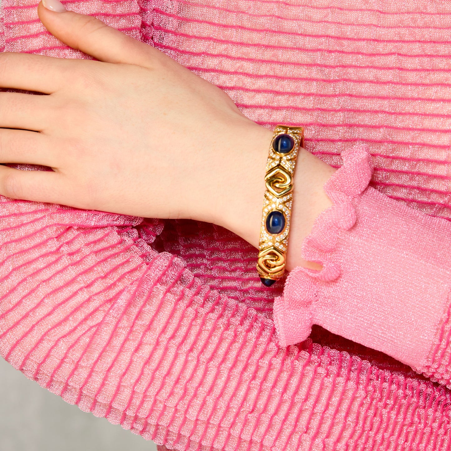 Bulgari 1970s 18KT Yellow Gold Sapphire & Diamond Bracelet on wrist
