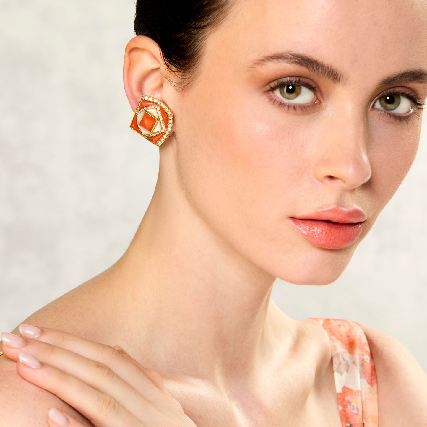 Bulgari 1980s 18KT Yellow Gold Coral, Diamond & Mother of Pearl Earrings on ear