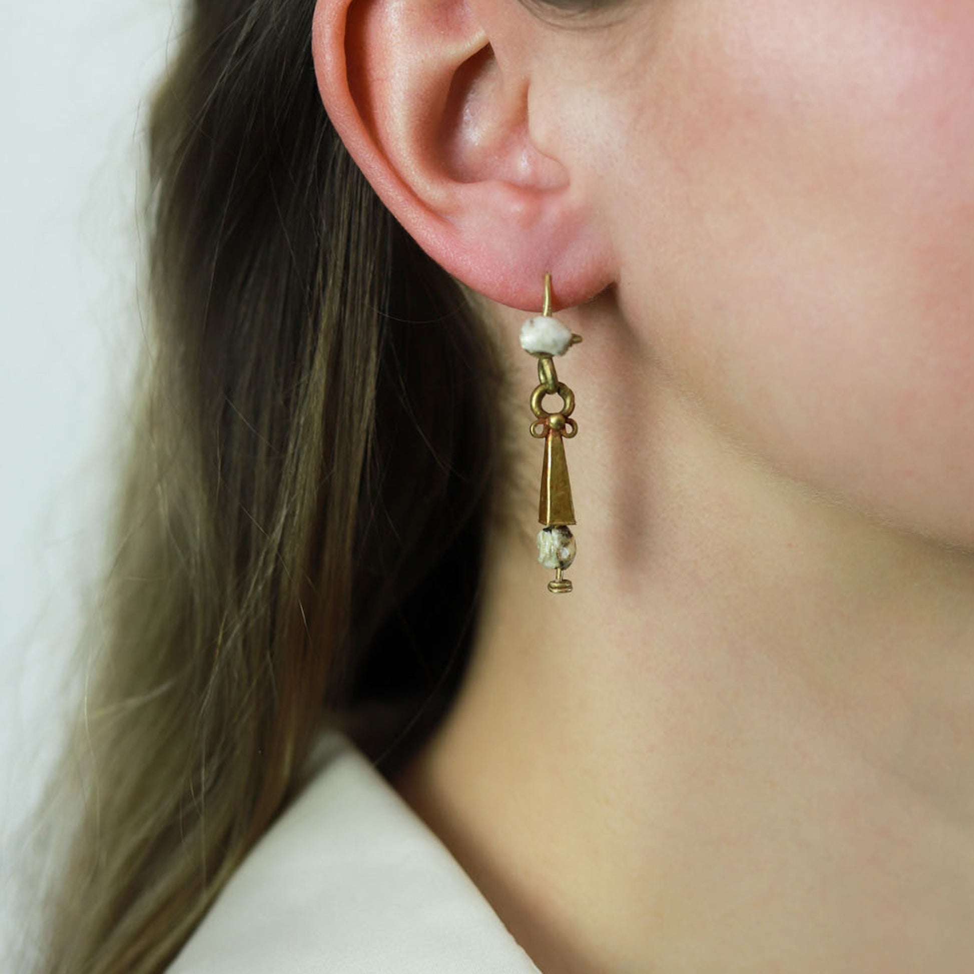 Ancient Roman 18KT Yellow Gold Natural Pearl Earrings on ear