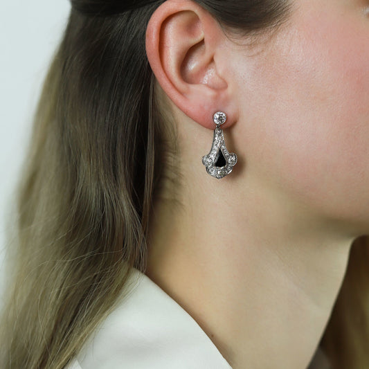 Art Deco Platinum Onyx & Diamond Earrings on ear