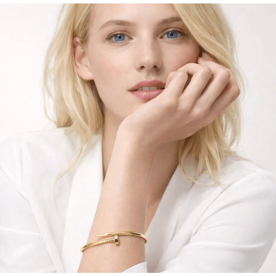 Cartier Post-1980s 18KT Yellow Gold Juste Un Clou Bracelet on wrist