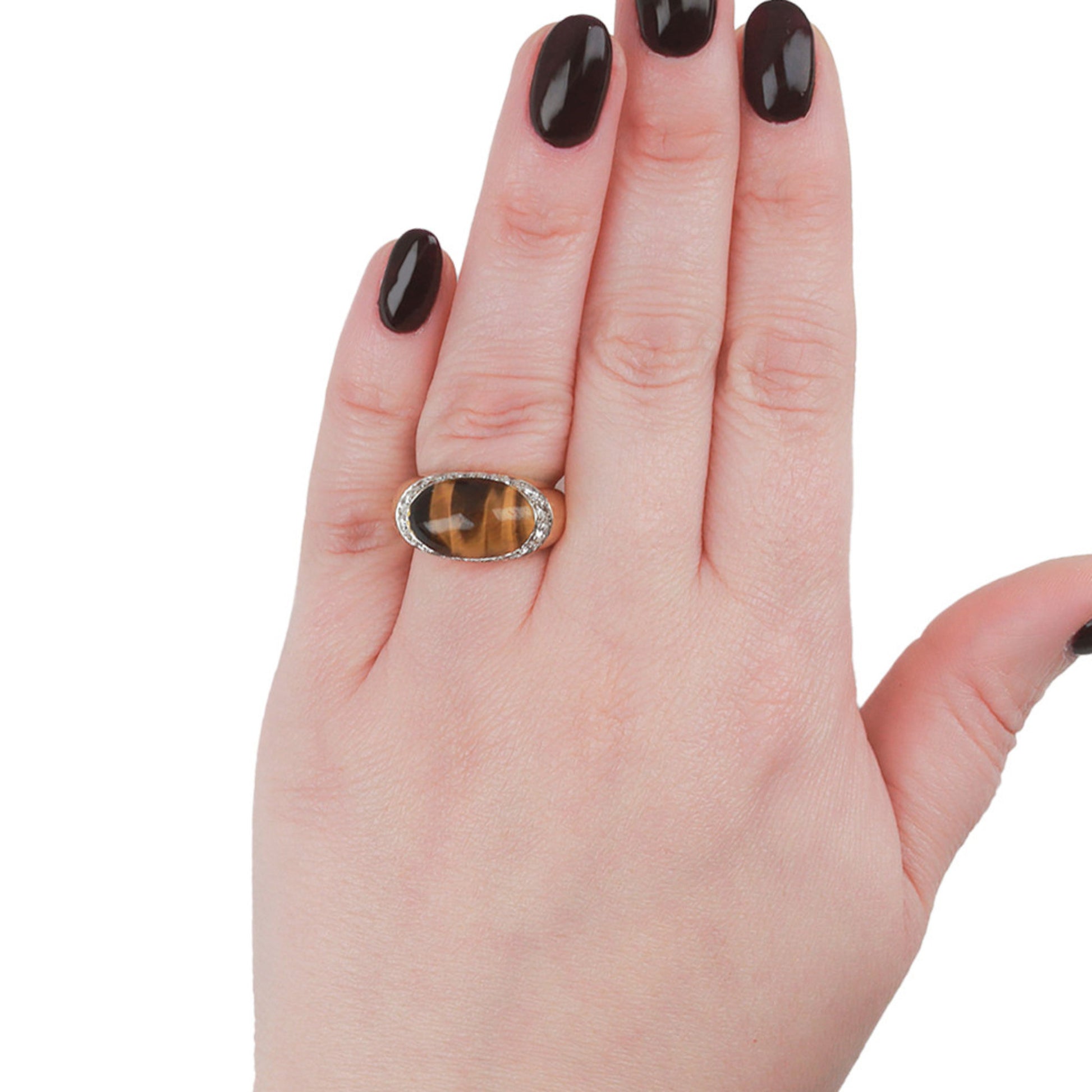 Kutchinsky London 1970s 18KT Yellow Gold Tiger's Eye & Diamond Ring on finger