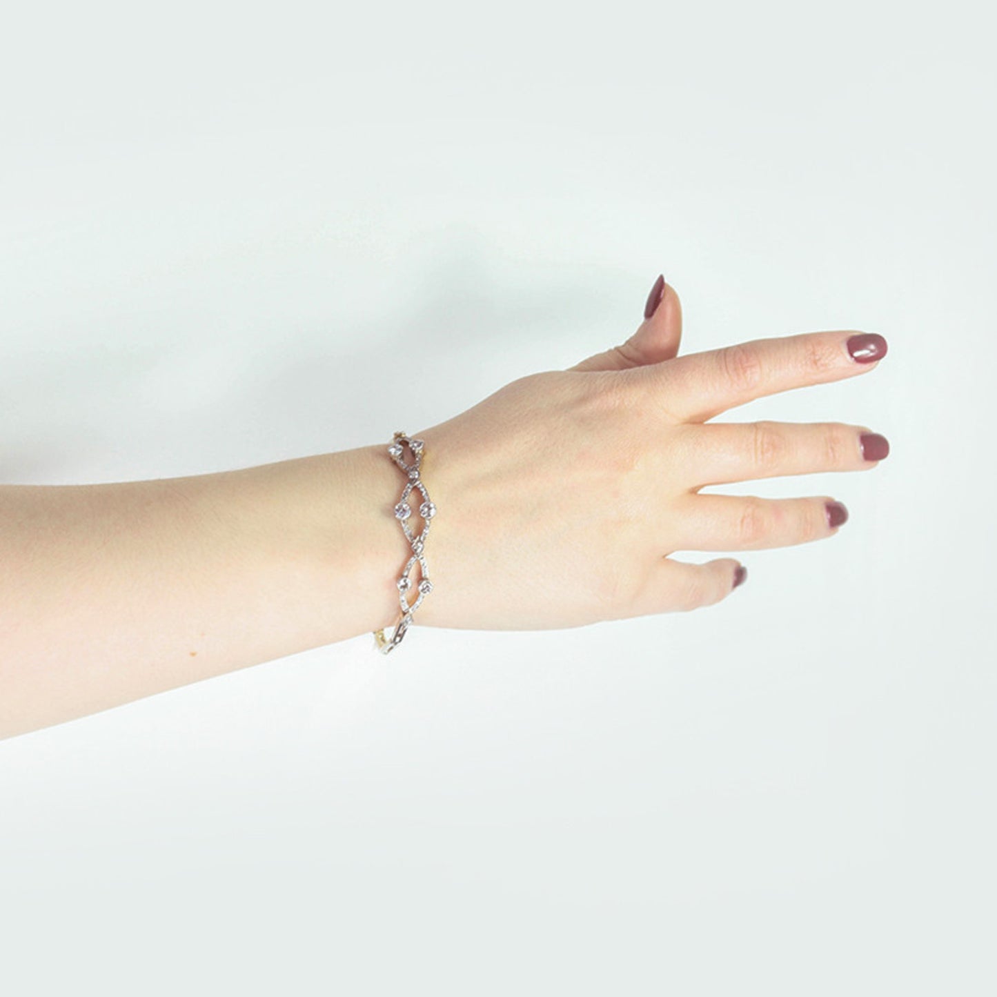 Edwardian Platinum & 18KT Yellow Gold Diamond Bracelet on wrist