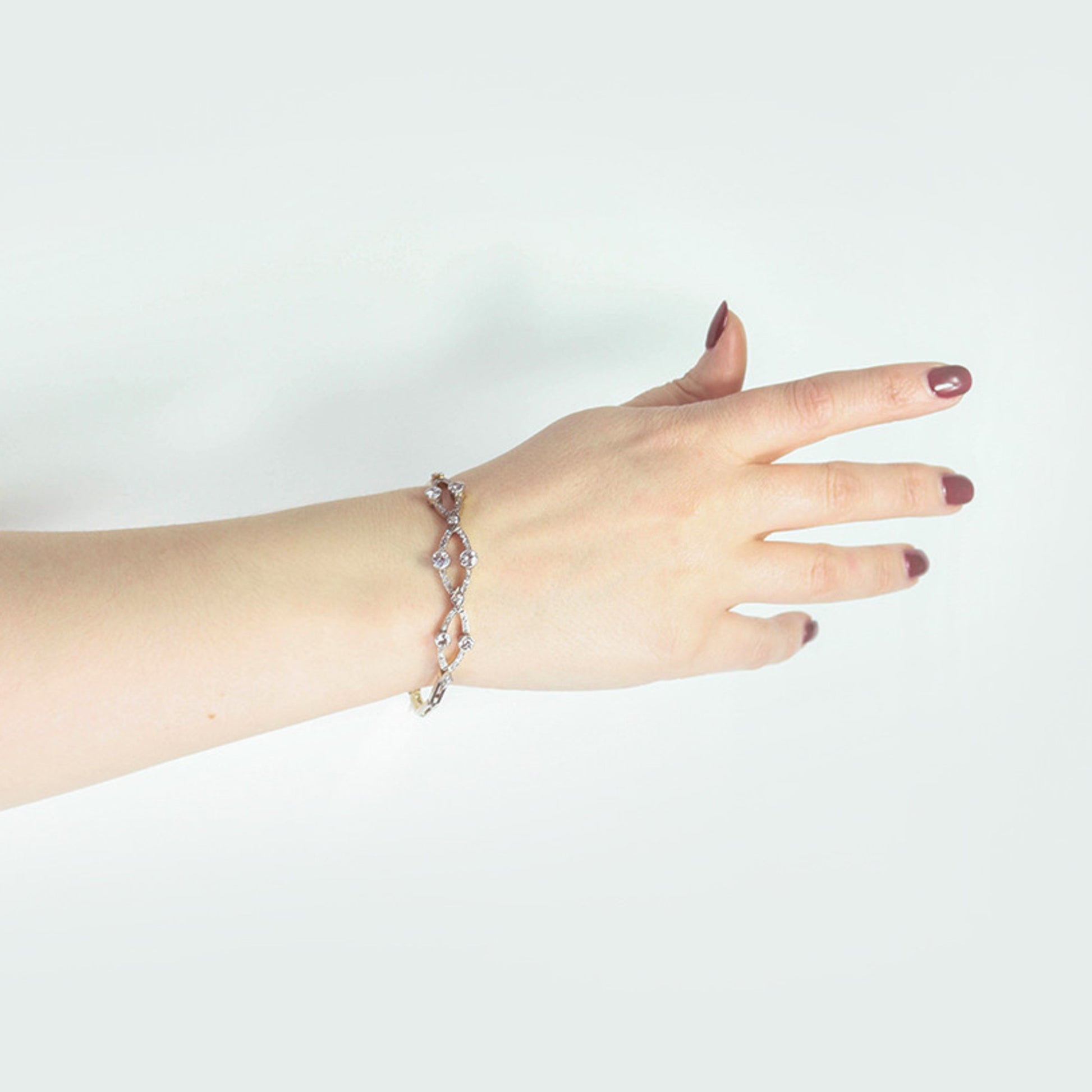 Edwardian Platinum & 18KT Yellow Gold Diamond Bracelet on wrist
