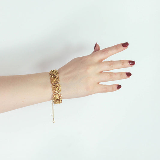 Wiese French Gothic Revival 18KT Yellow Gold Bracelet on wrist