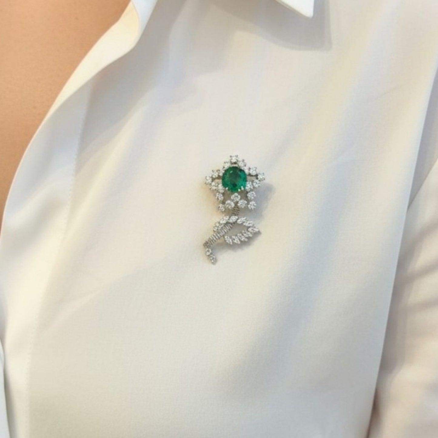 1950s Platinum & 18KT Yellow Gold Diamond & Emerald Flower Brooch on blouse