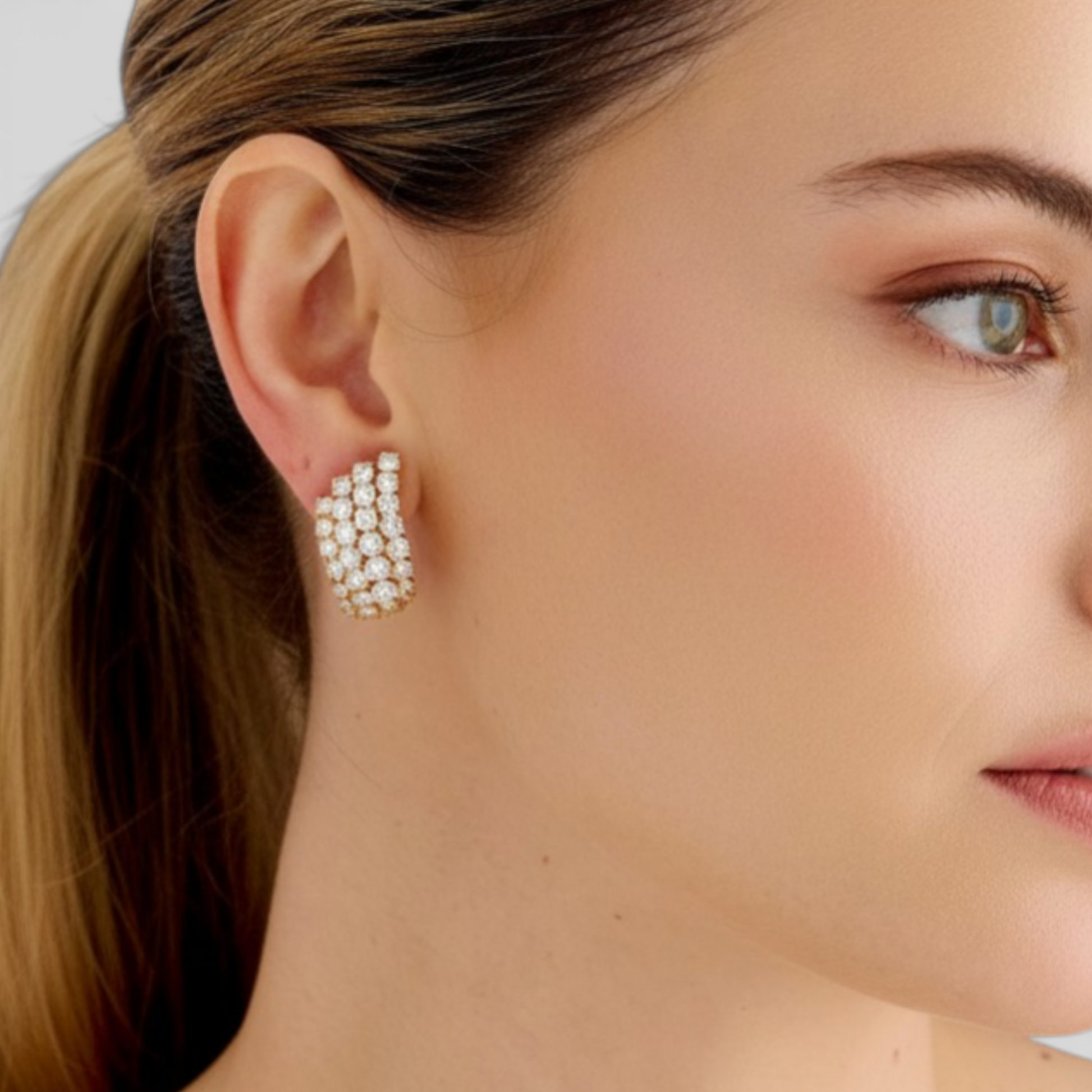 Cartier Paris 1970s 18KT Yellow Gold Diamond Earrings on ear