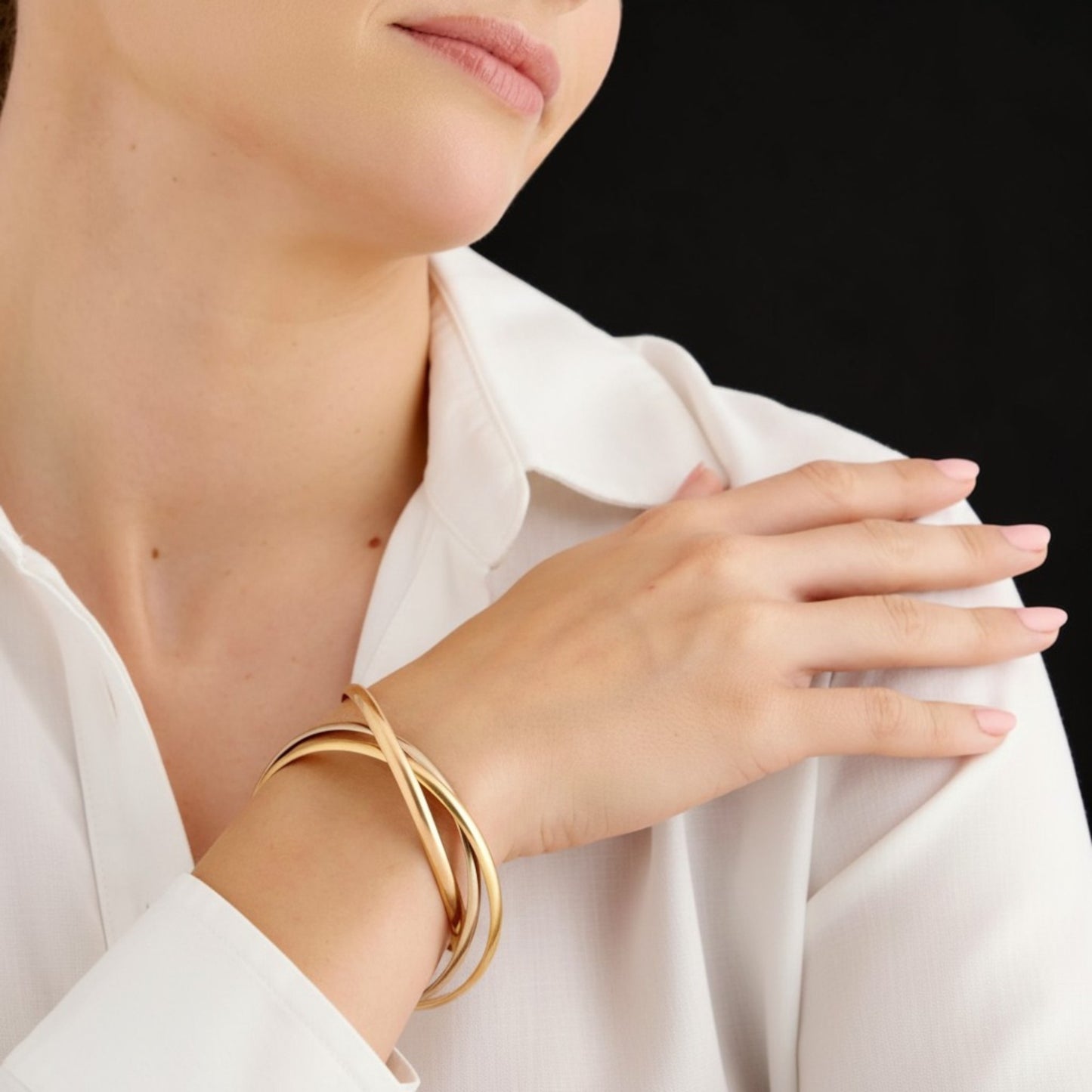 Cartier French Post-1980s 18KT Rose, White & Yellow Gold Trinity Bracelet on wrist