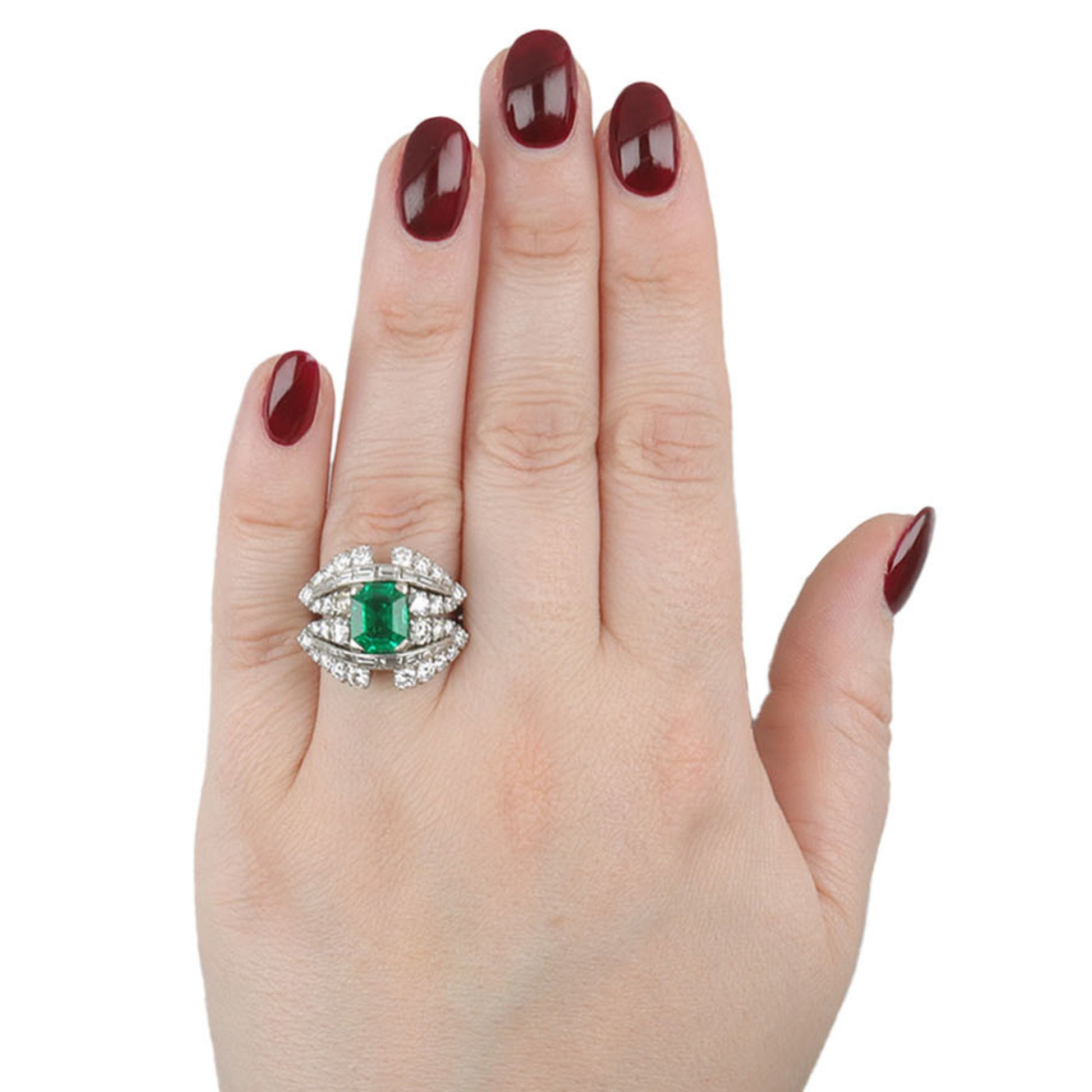 Italian 1970s Platinum Emerald & Diamond Ring on finger