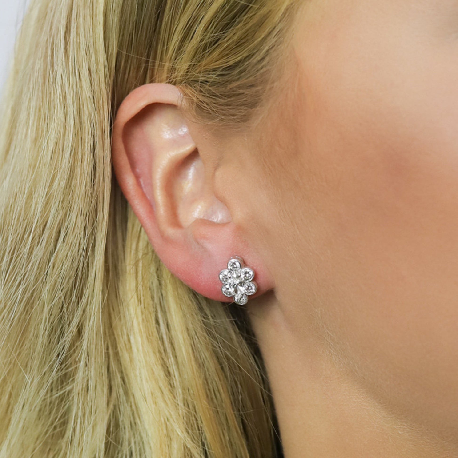 1970s 18KT White Gold Diamond Earrings on ear