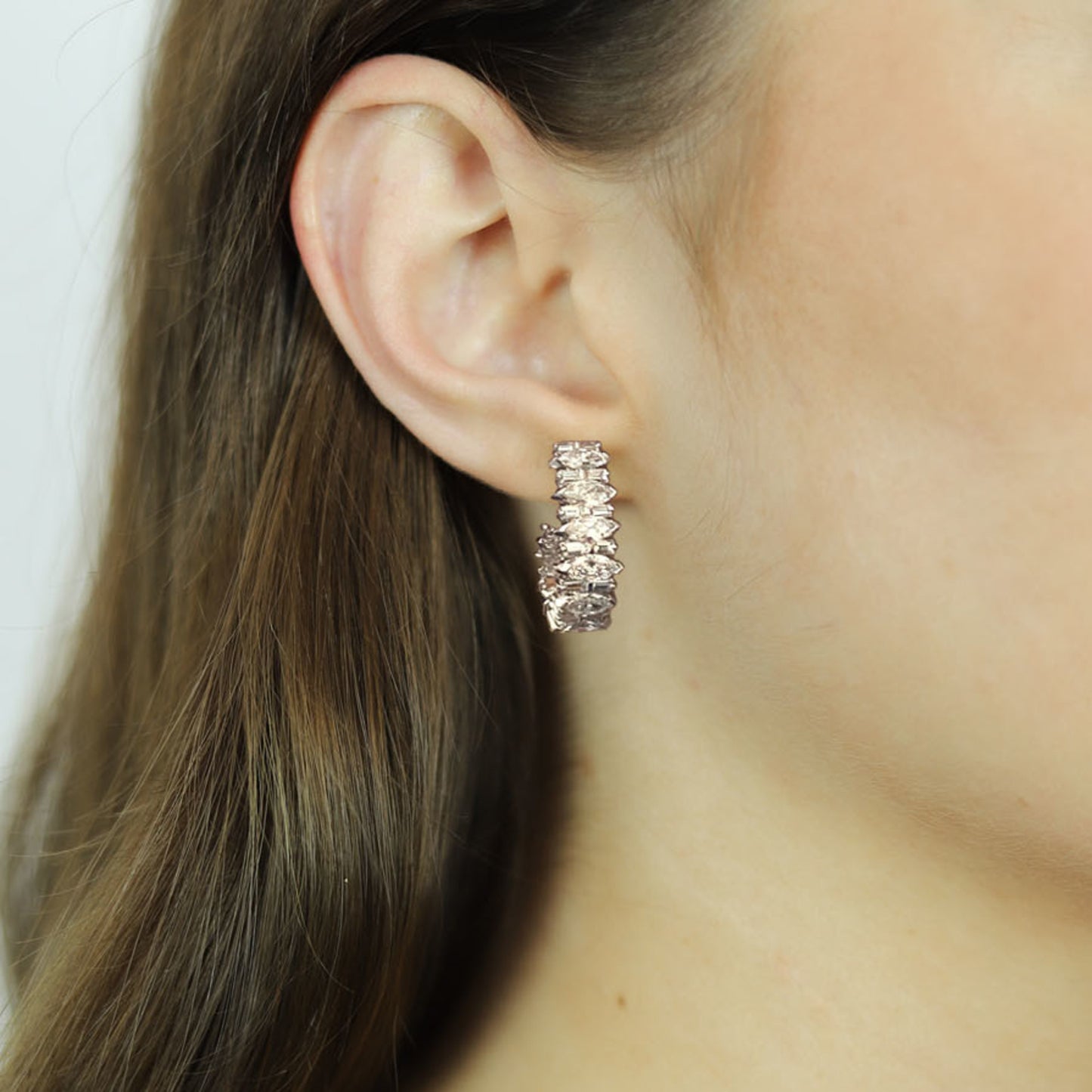 Kutchinsky 1970s Platinum & 18KT Yellow Gold Diamond Earrings on ear