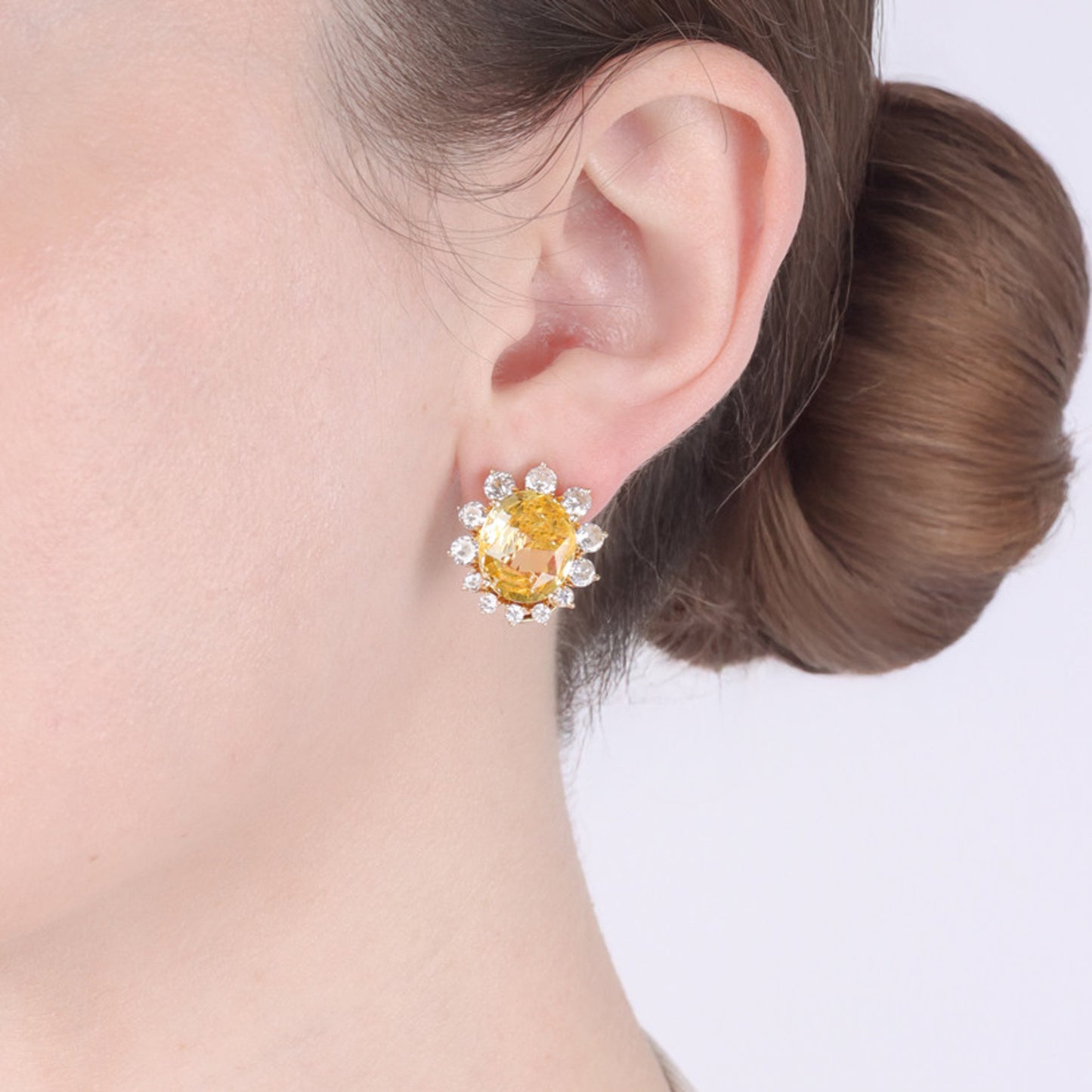 1960s 18KT Yellow Gold Sapphire & Diamond Earrings on ear