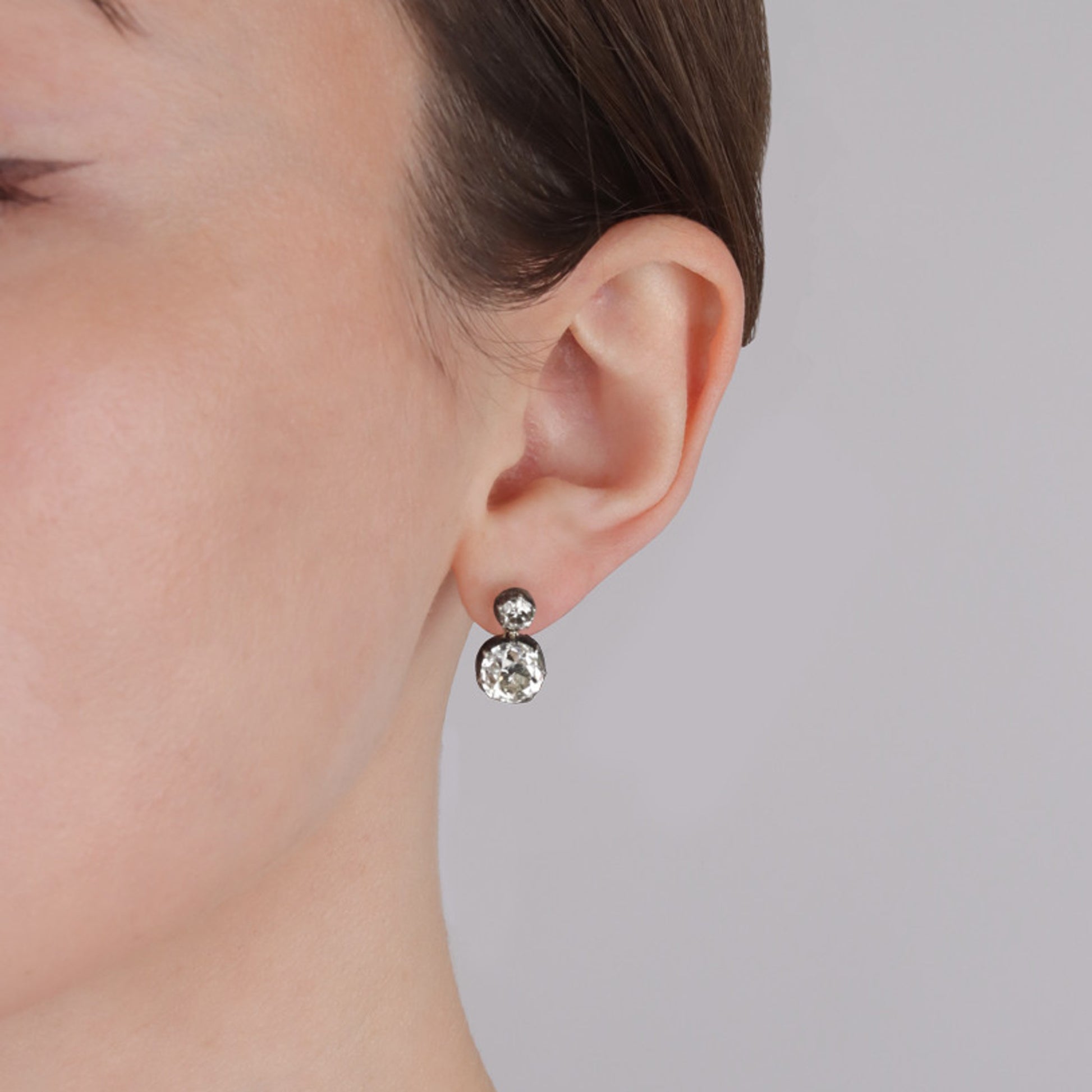 Victorian Silver & 18KT Yellow Gold Diamond Earrings on ear
