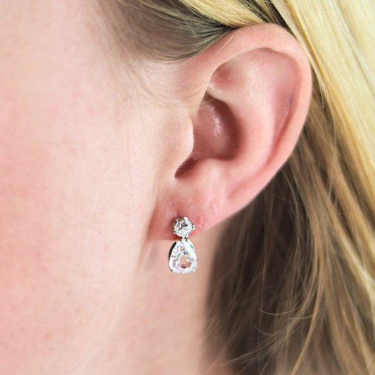 Art Deco Platinum Diamond Earrings on ear