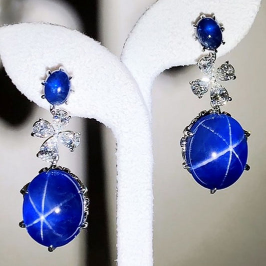 Contemporary 18KT White Gold Star Sapphire & Diamond Earrings front