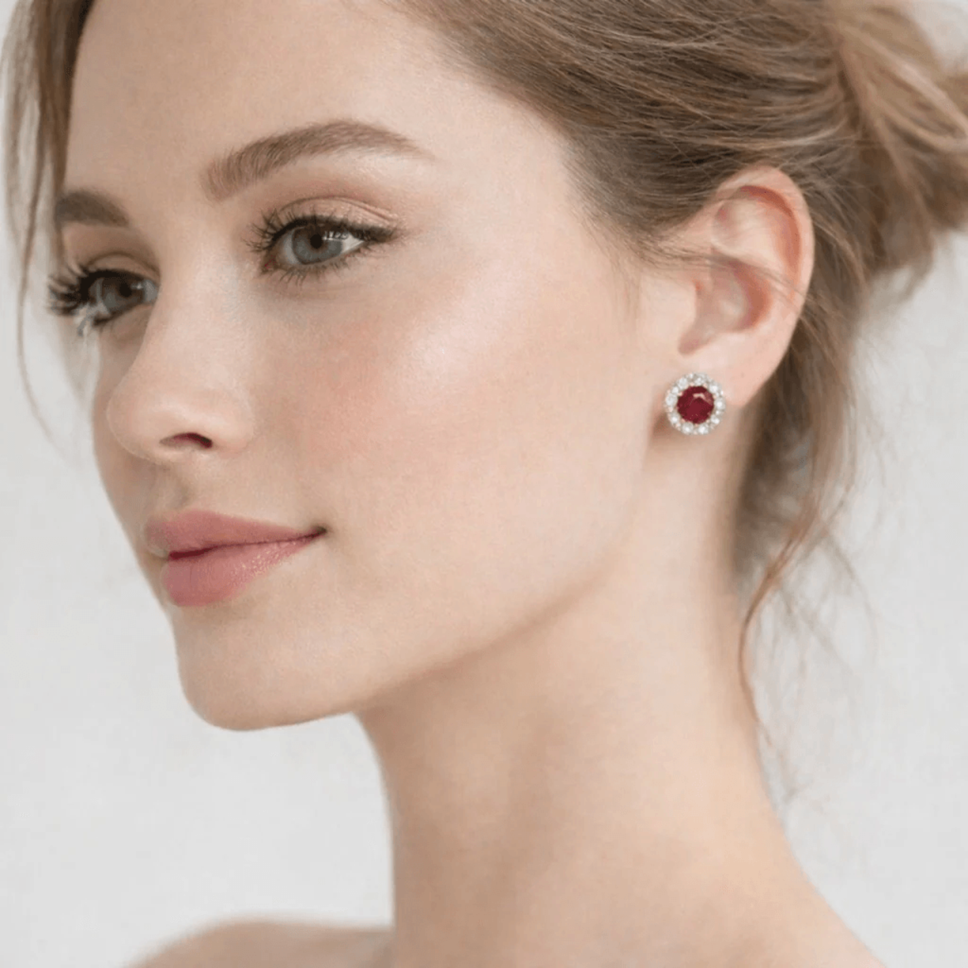 Contemporary 14KT Yellow Gold Ruby & Diamond Earrings on ear