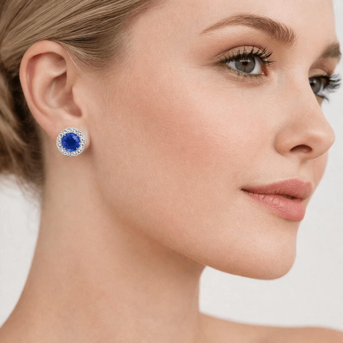 Contemporary 18KT White Gold Sapphire & Diamond Earrings on ear