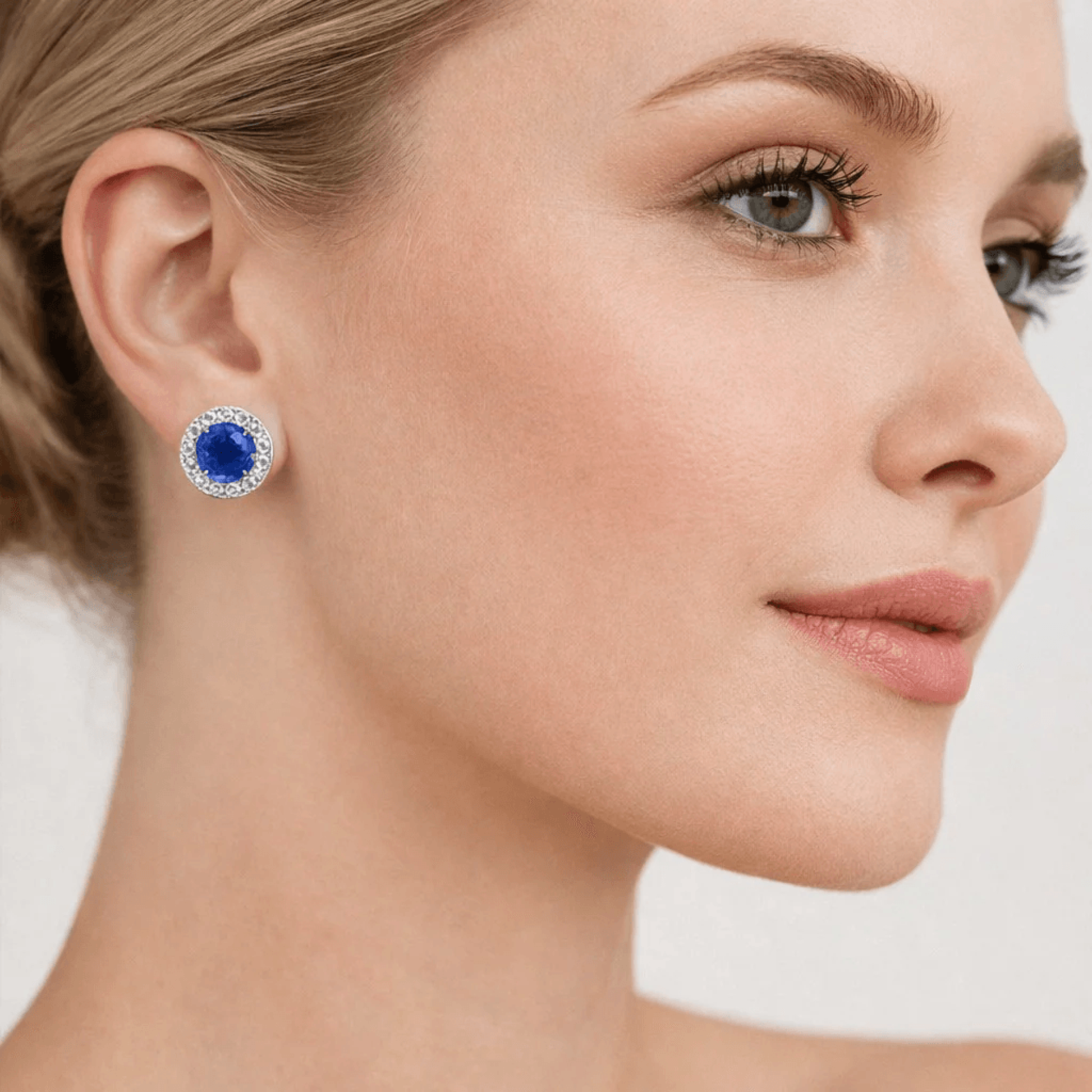 Contemporary 18KT White Gold Sapphire & Diamond Earrings on ear