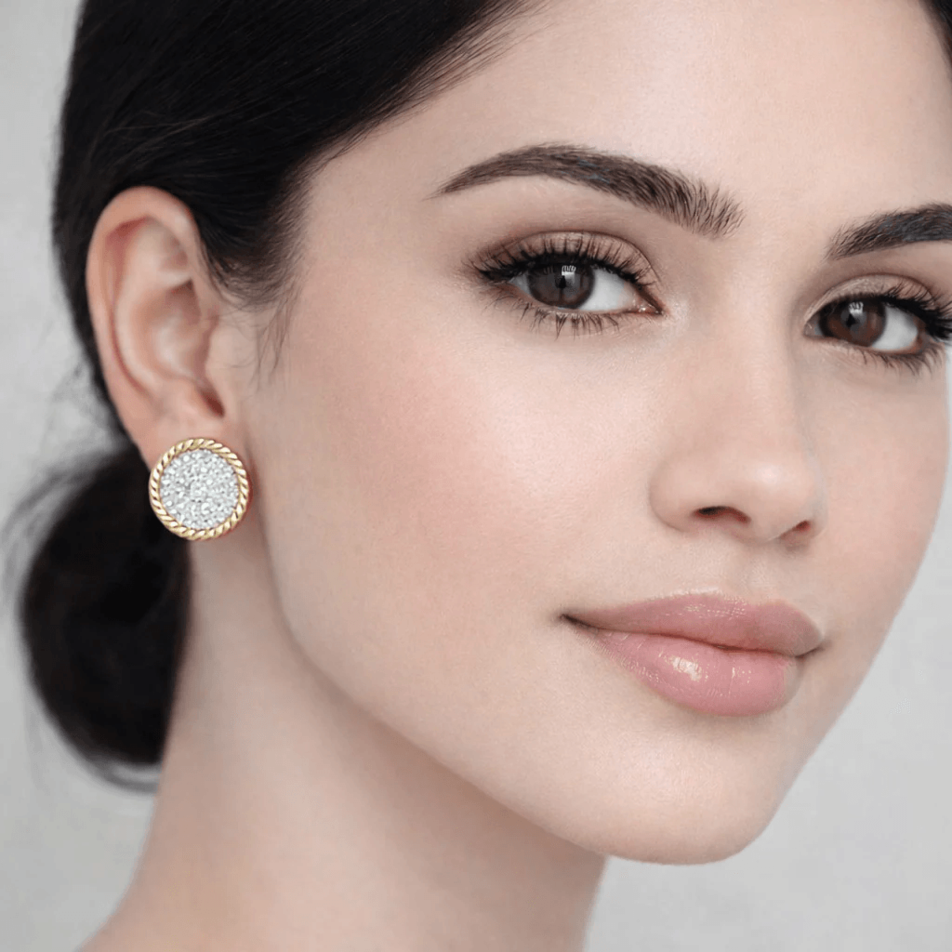 Contemporary 14KT White & Yellow Gold Diamond Earrings on ear