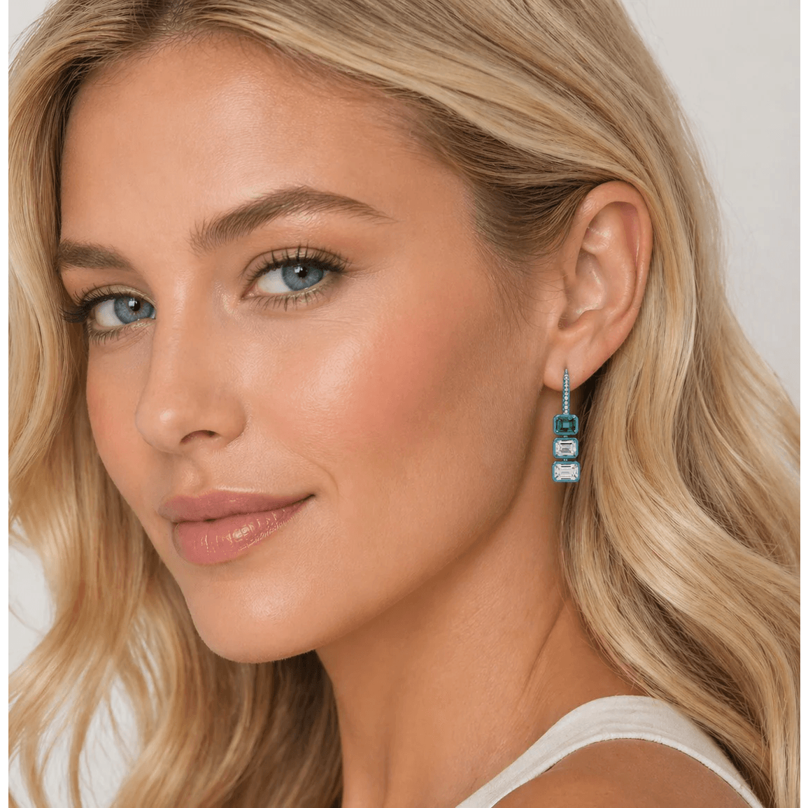 Post-1980s Titanium Emerald & Diamond Earrings on ear