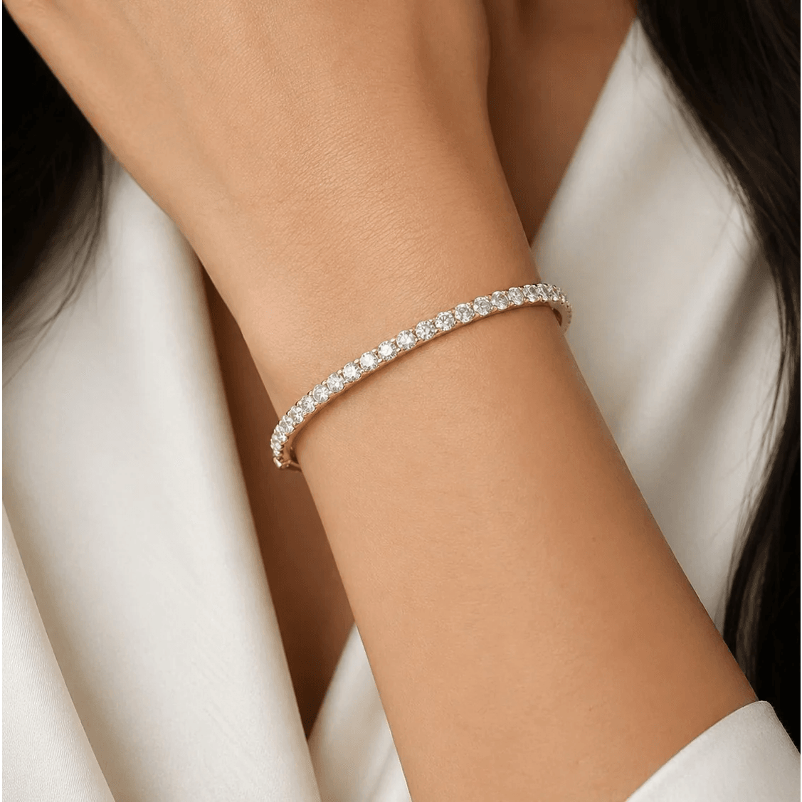 Contemporary 14KT Yellow Gold Diamond Bracelet on wrist