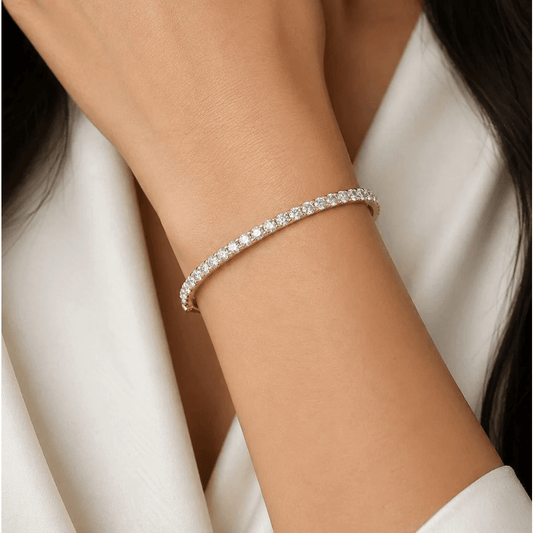 Contemporary 14KT Yellow Gold Diamond Bracelet on wrist