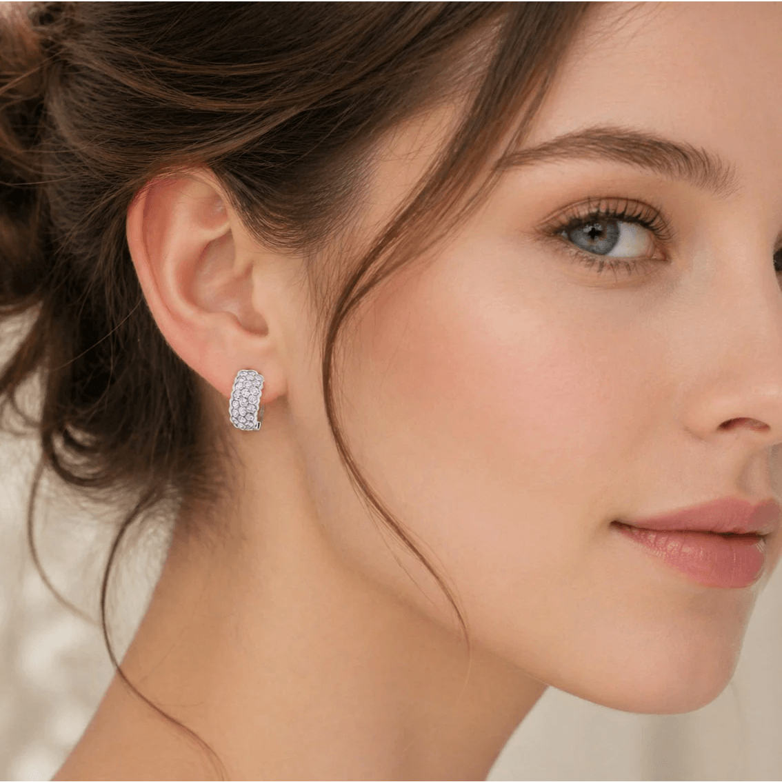 Contemporary 18KT White Gold Diamond Earrings on ear