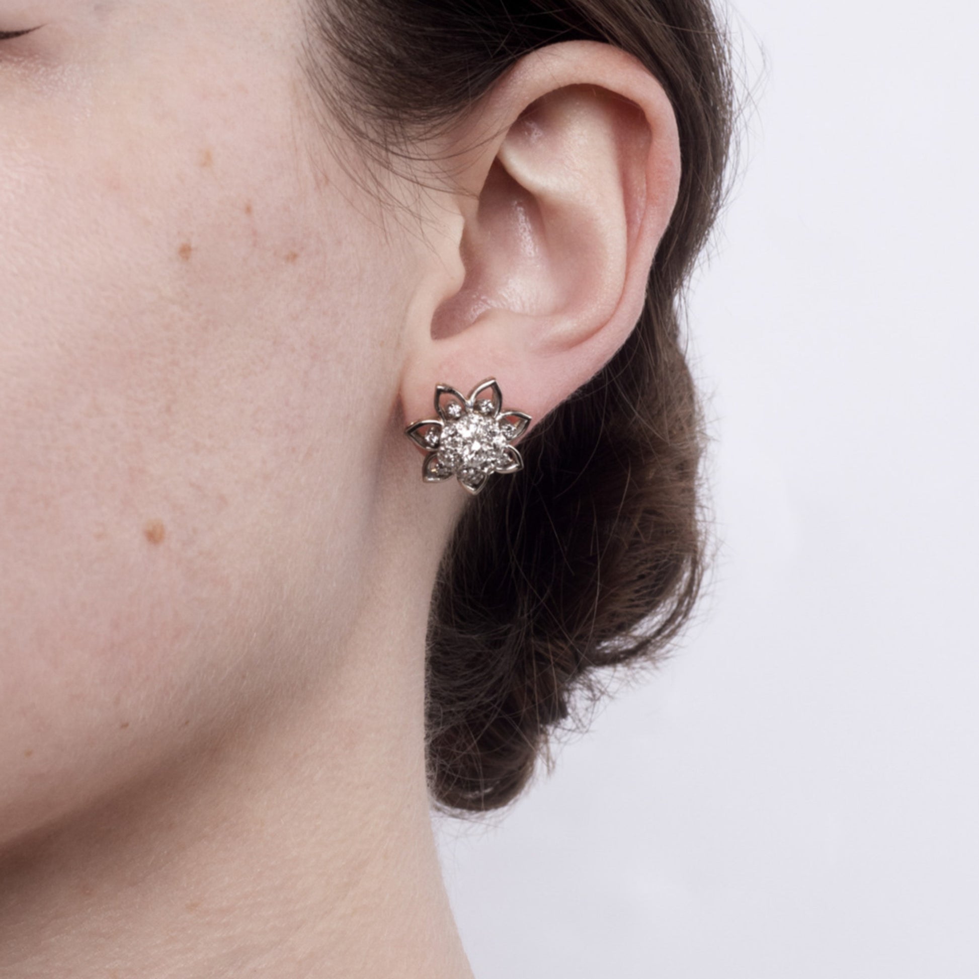 1940s Platinum & 18KT Yellow Gold Diamond Earrings on ear