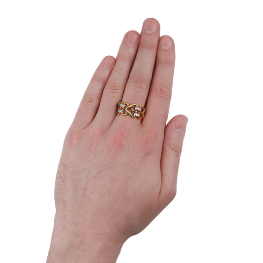 Kutchinsky English 1970s 18KT Yellow Gold Diamond Ring on finger