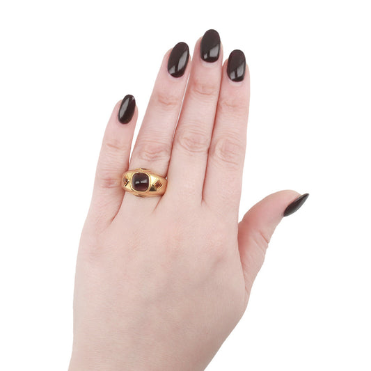 Kutchinsky 1980s 18KT Yellow Gold Amethyst & Citrine Ring on finger