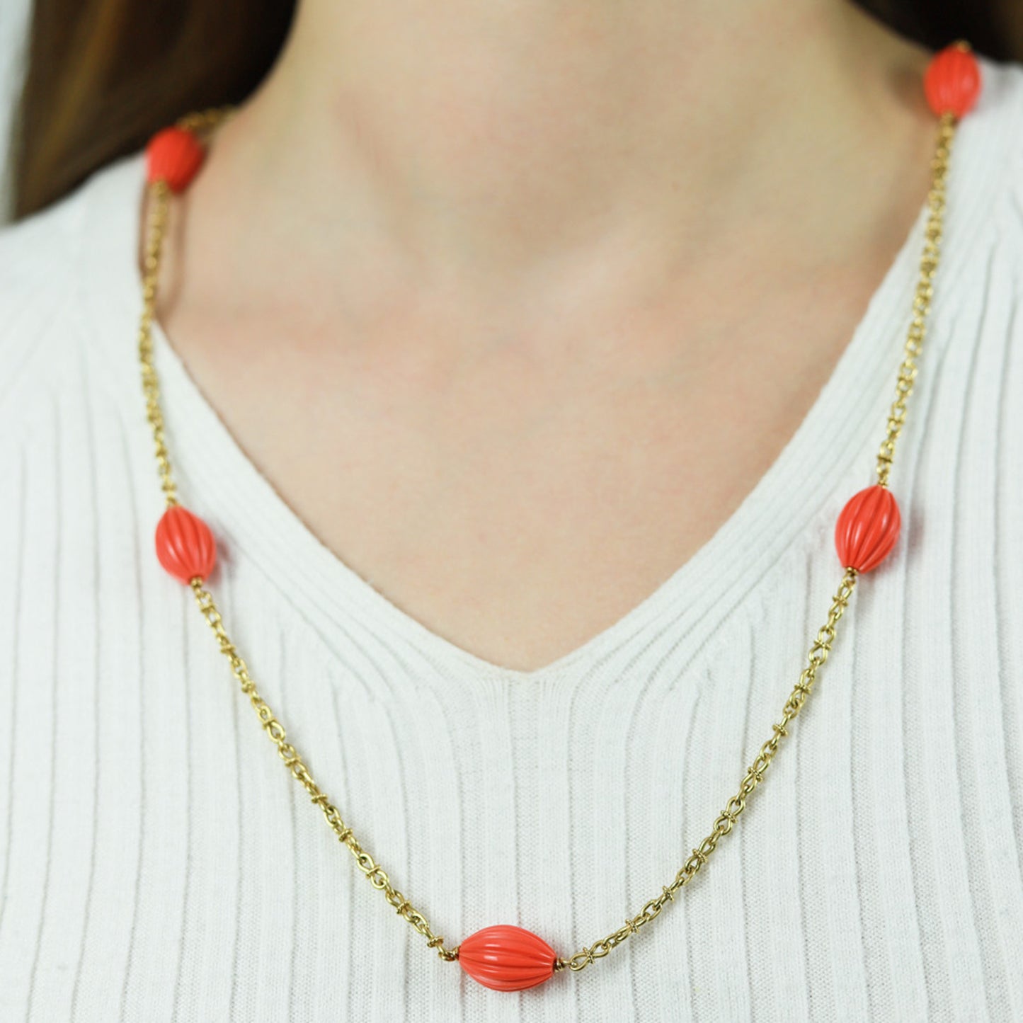 French 1970s 18KT Yellow Gold Coral Necklace on neck