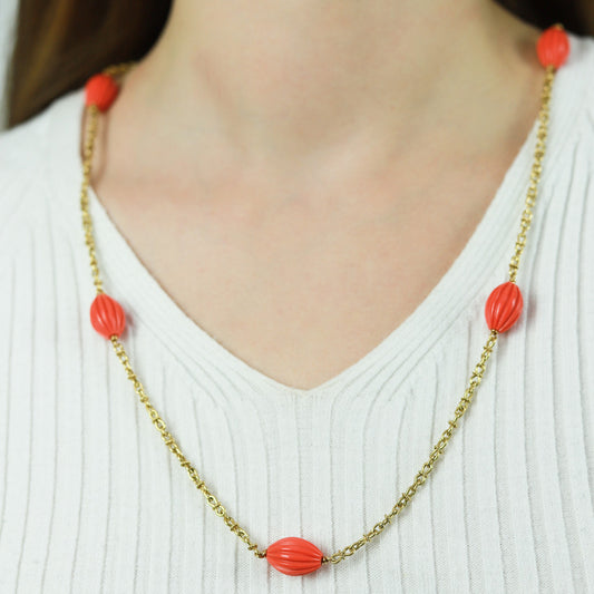 French 1970s 18KT Yellow Gold Coral Necklace on neck