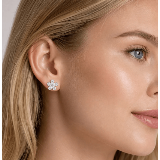 Contemporary Platinum Diamond Earrings on ear