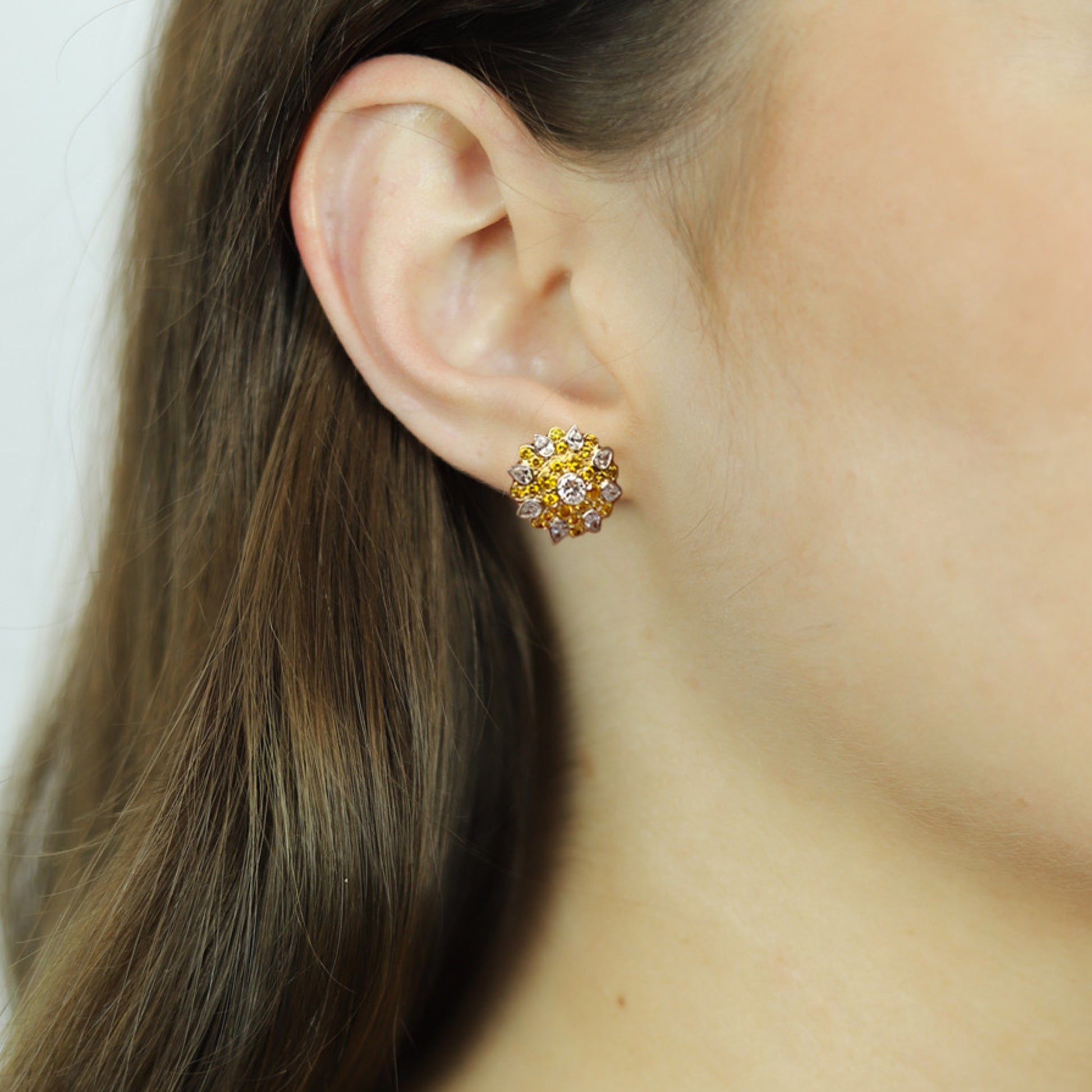 Kutchinsky London 1970s 18KT Yellow Gold Diamond Earrings on ear