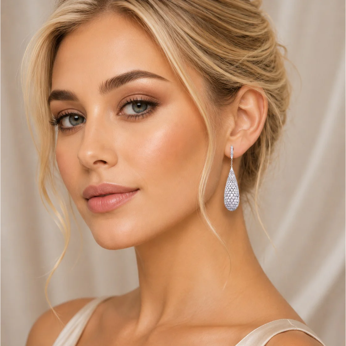 Contemporary 18KT White Gold Diamond Earrings on ear
