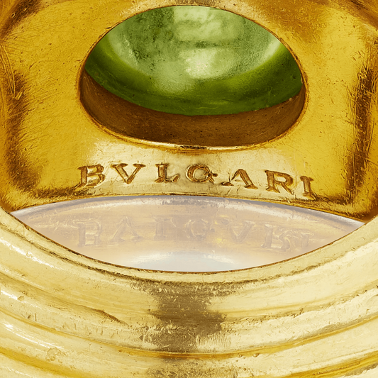 Bulgari 1980s 18KT Yellow Gold Peridot & Tourmaline Doppio Ring signature