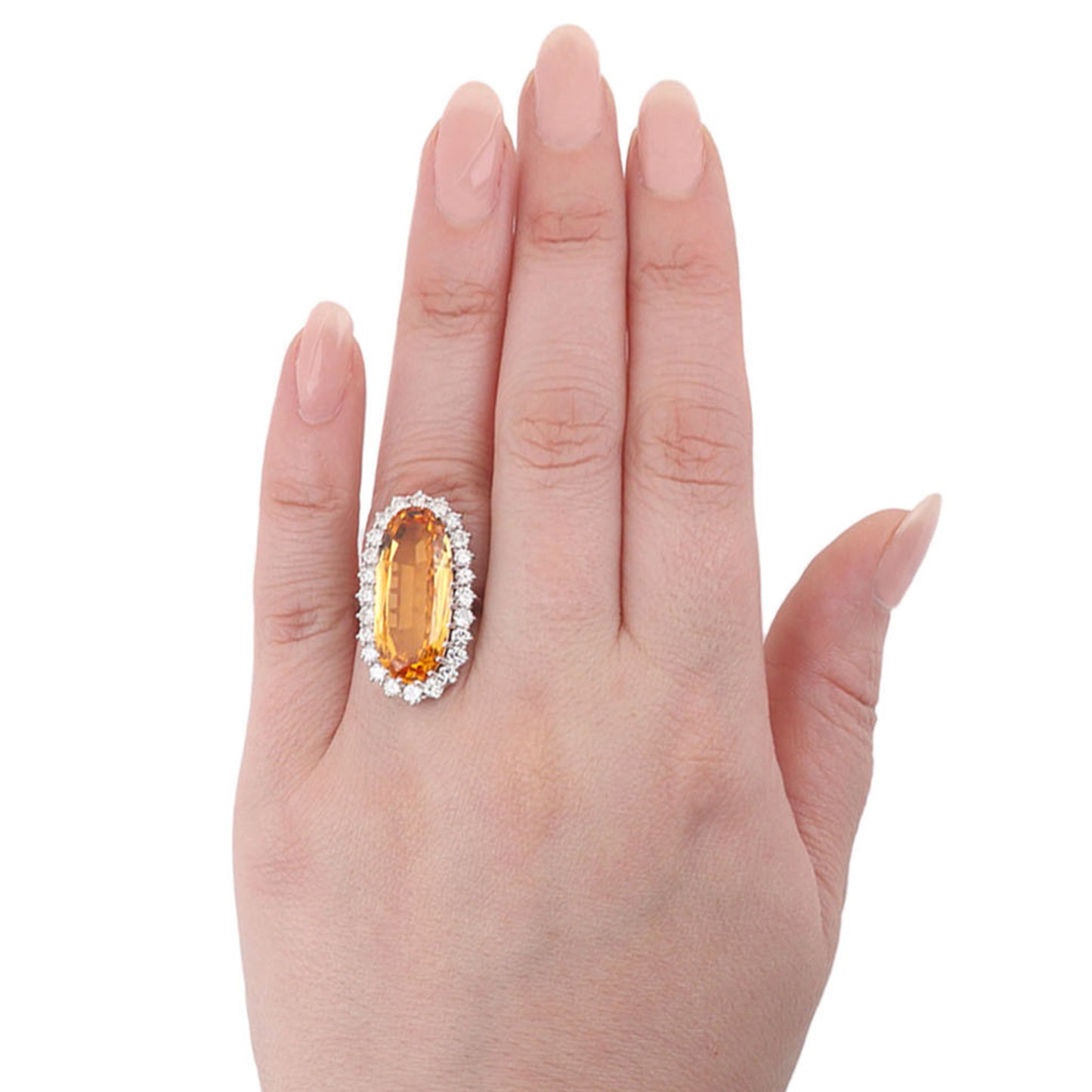 English 1980s 18KT White Gold Imperial Topaz & Diamond Ring on finger